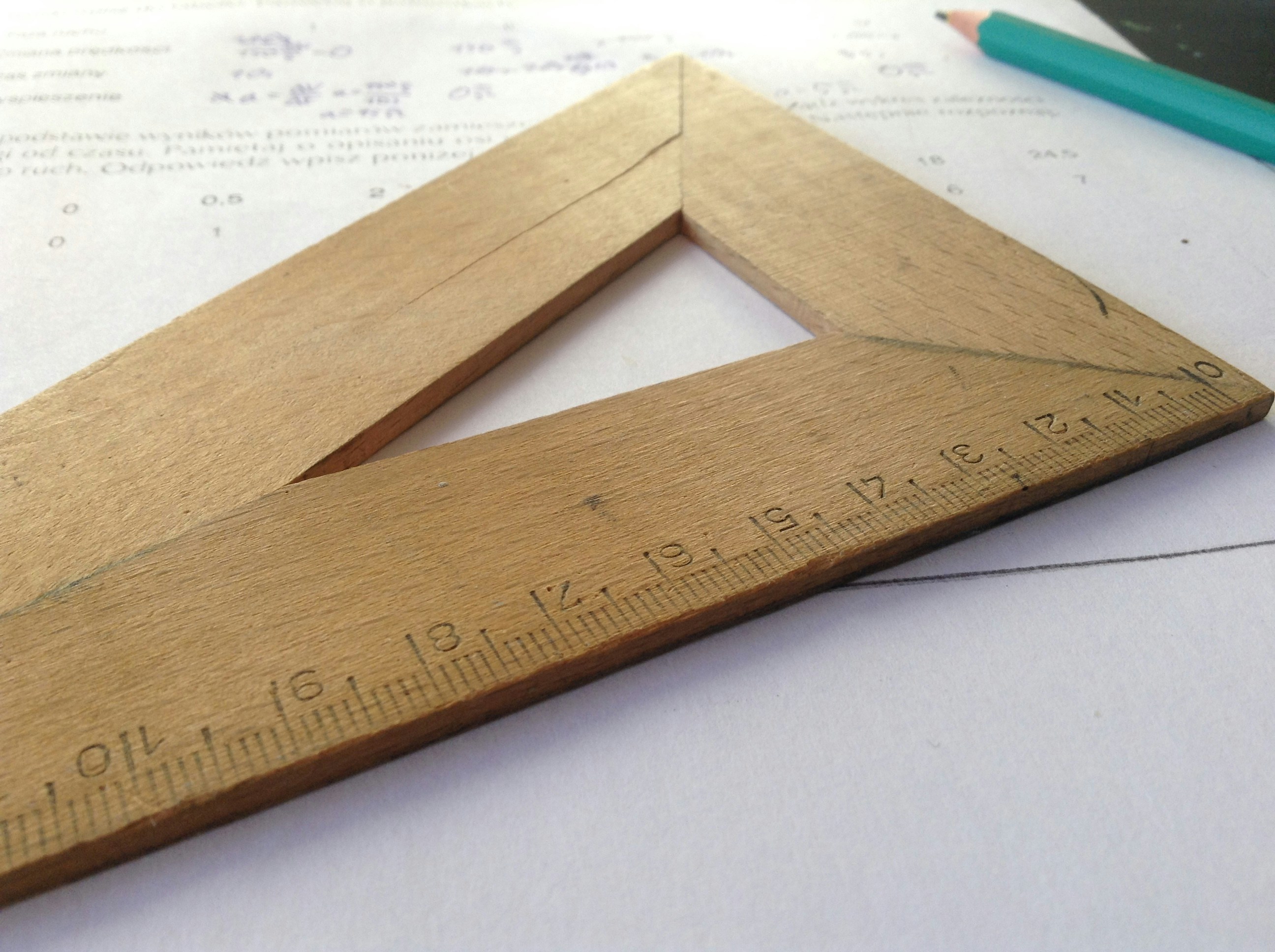 image of a ruler on a stack of papers