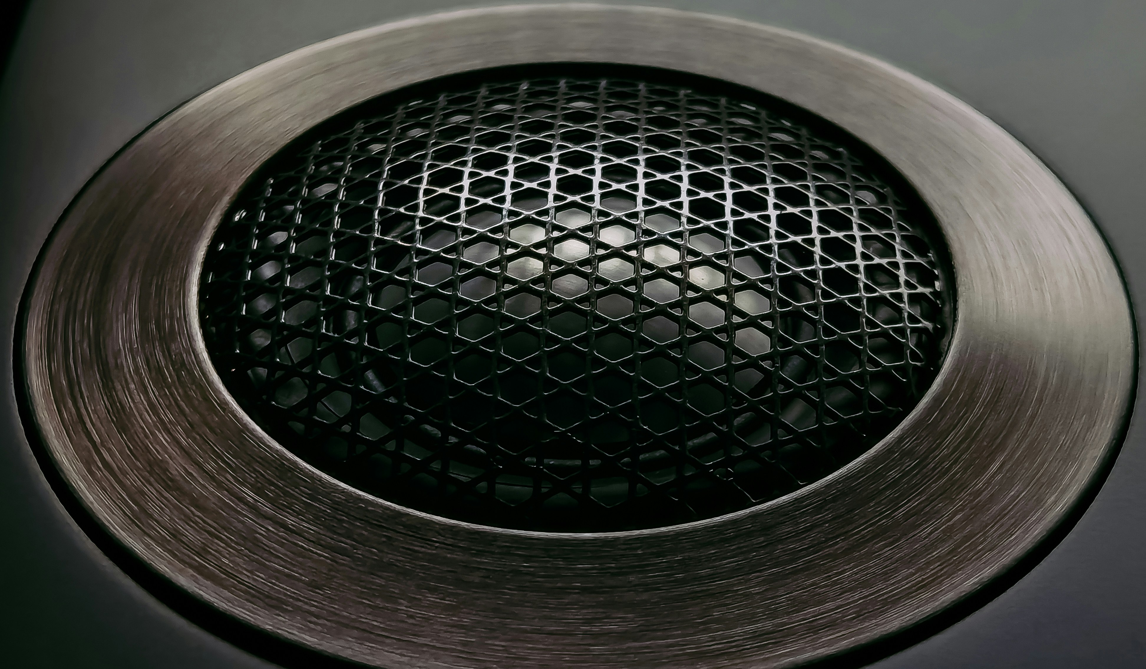 close-up shot of a speaker driver